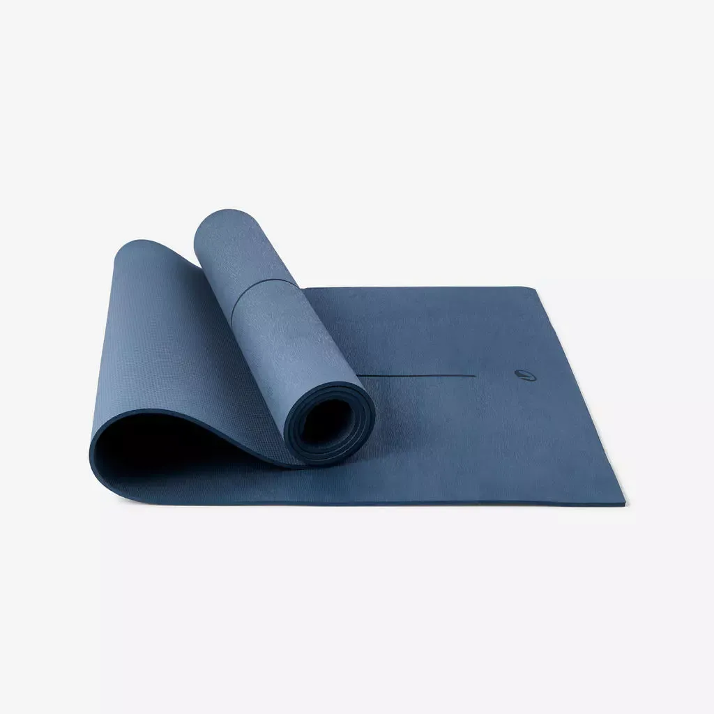 Decathlon Kimjaly 5mm foam beginner yoga mat rolled out, dark blue