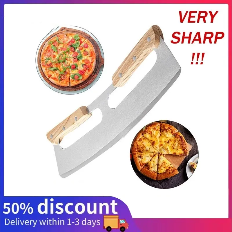 Half-moon stainless steel rocker pizza cutter with twin wooden handles, angled view beside a sliced pizza