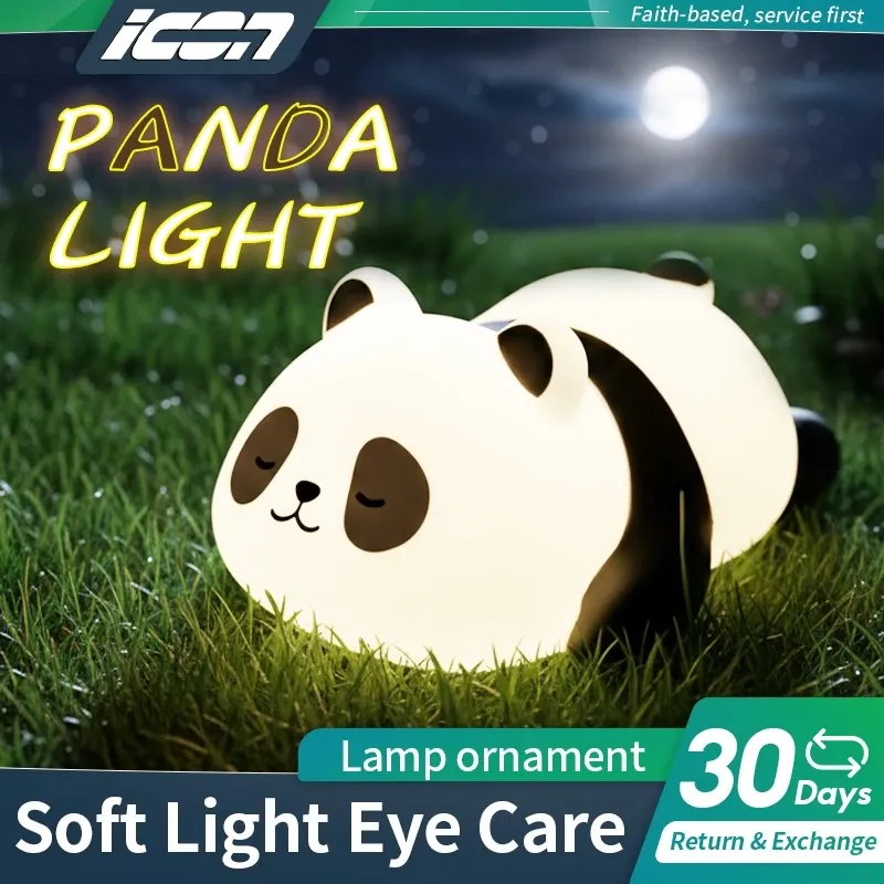 ICON panda-shaped soft silicone patting night light glowing warm white on a bedside table