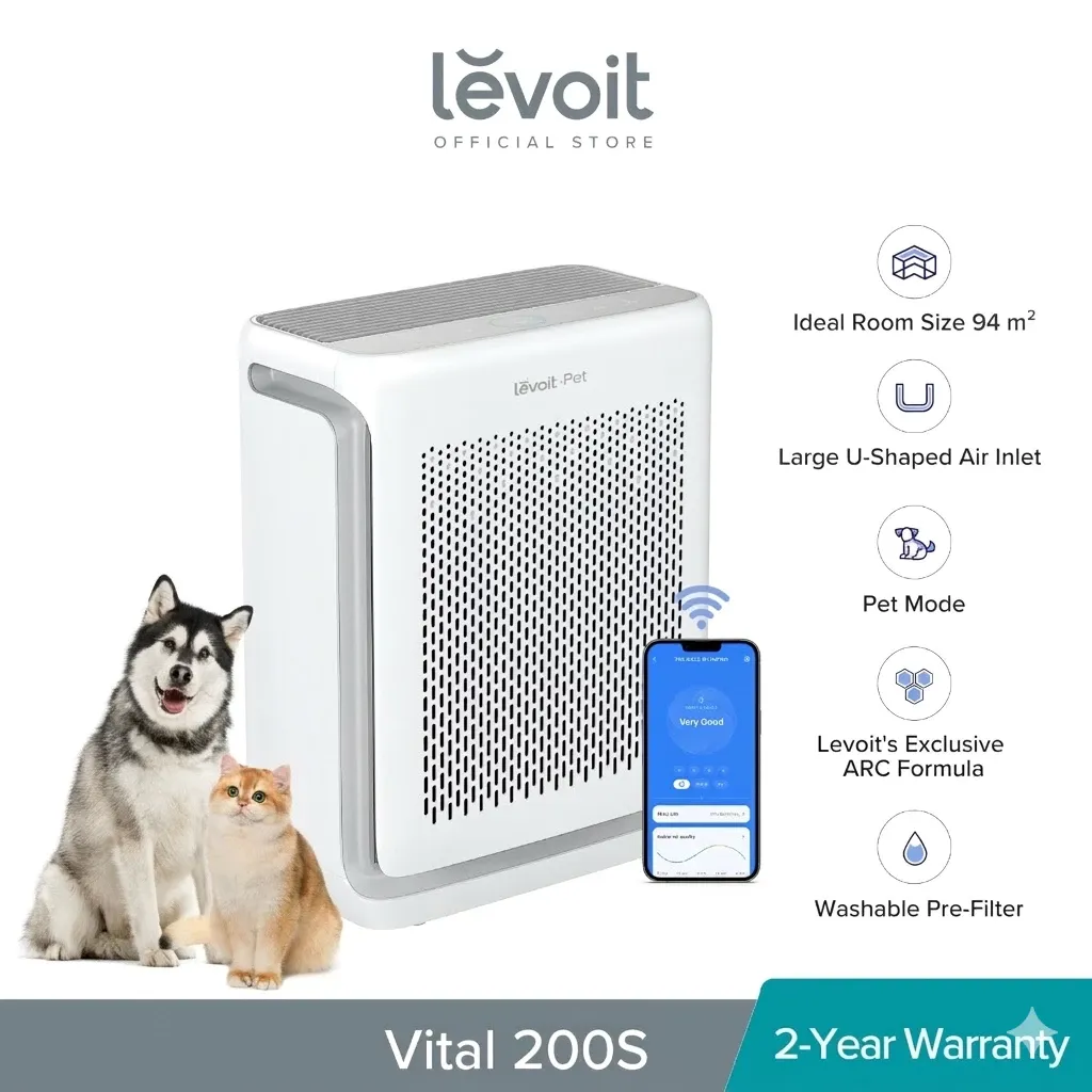 Levoit Vital 200S smart air purifier, large white unit with slotted front panel and side handle, shown with a dog and a cat