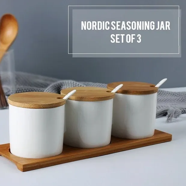 LOCAUPIN set of three white porcelain condiment jars with bamboo lids on a tray, front view