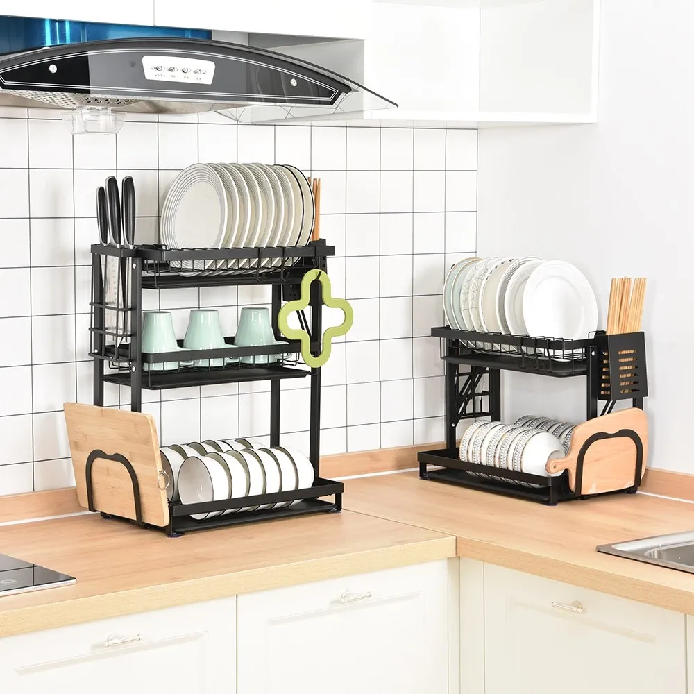 LOCAUPIN black foldable metal dish rack with plate tier, cup shelf, chopstick holder and chopping board slot in a kitchen, angled view