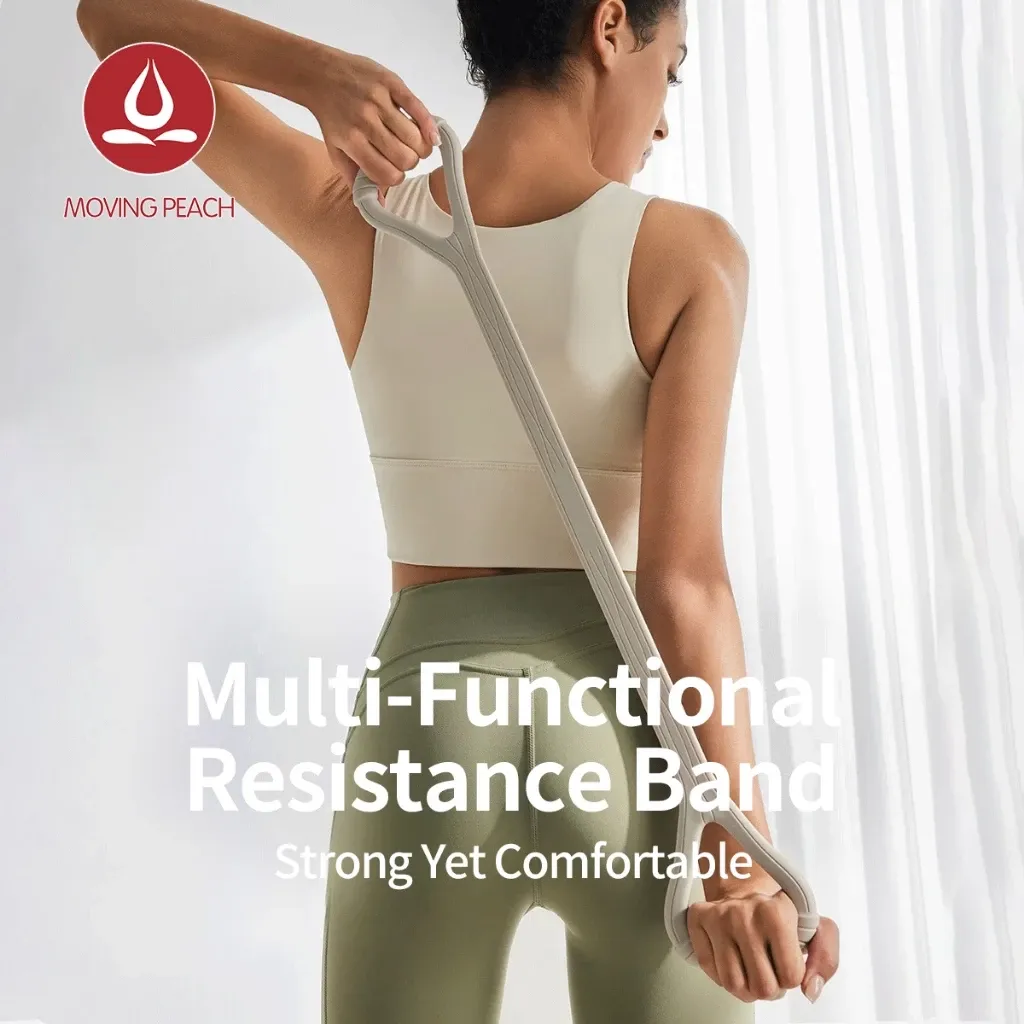 Moving Peach figure-8 silicone resistance band being pulled behind the back for a shoulder stretch