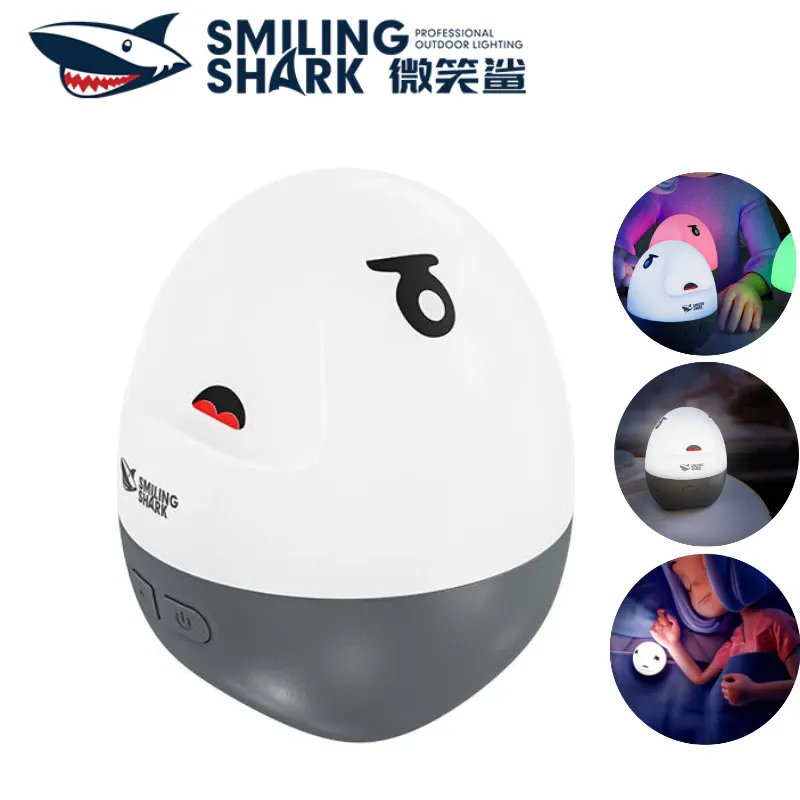 Smiling Shark XYD027 soft-touch rechargeable night light showing colored atmospheric lighting