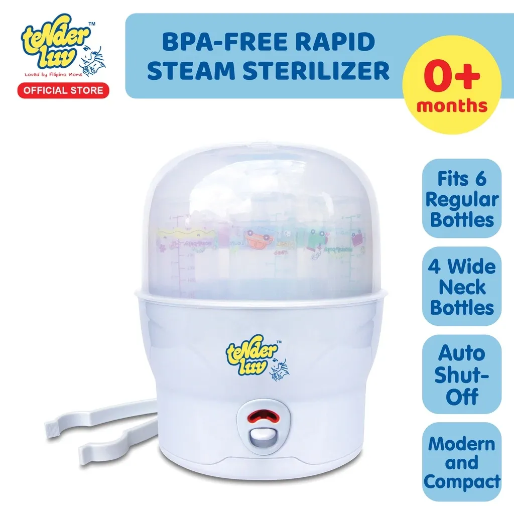 Tender Luv white rapid baby bottle steam sterilizer with domed clear lid, bottles inside and a pair of white tongs beside it