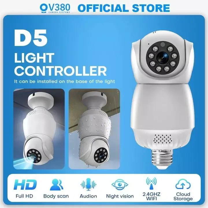 V380 D5 bulb security camera with an E27 screw base and a pan-and-tilt lens head ringed by LEDs, shown fitted to a ceiling light socket