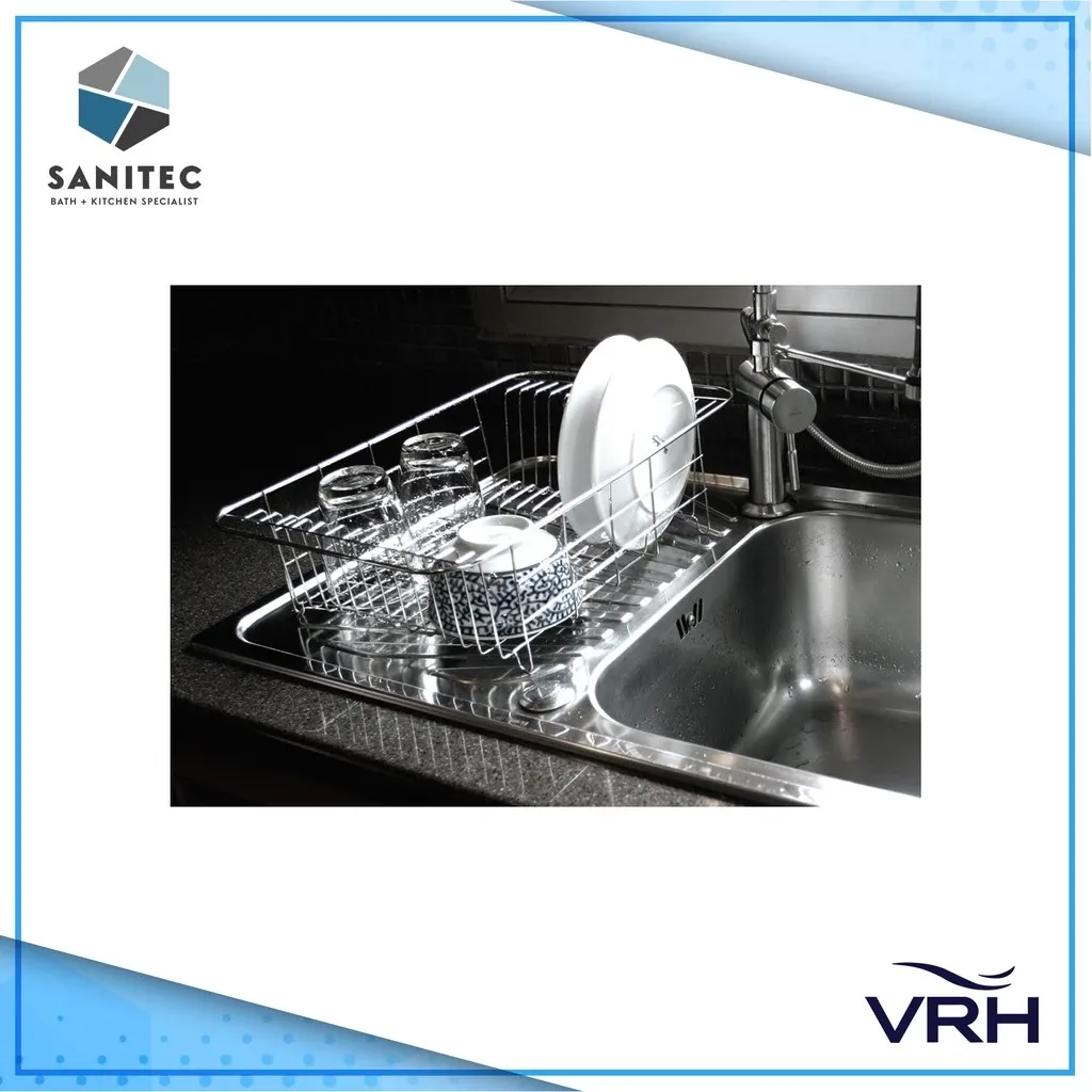 VRH stainless steel 201 over-sink dish rack basket resting across a stainless sink, holding plates and upturned glasses, angled view